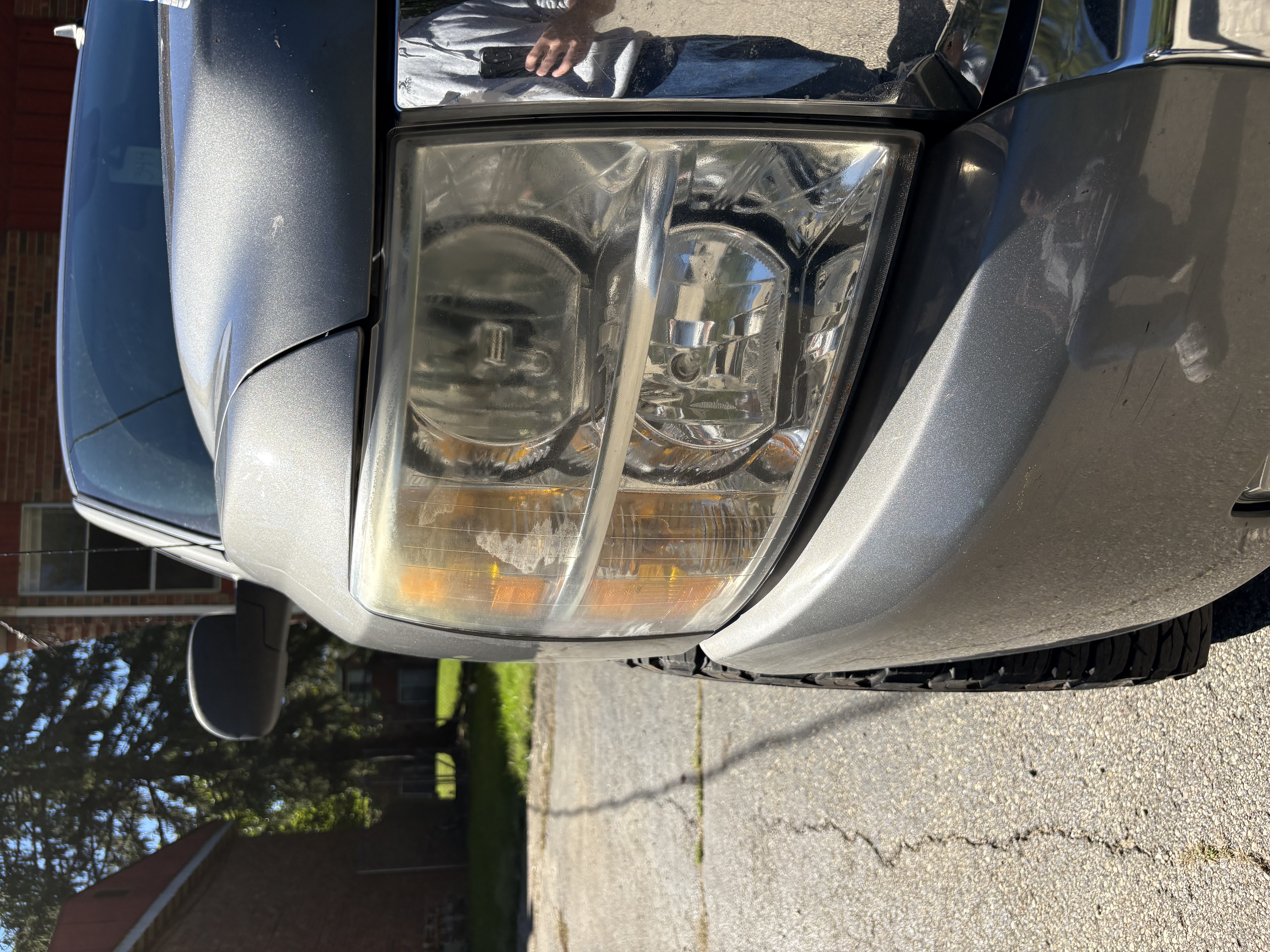 Hazy, oxidized headlight lens before restoration